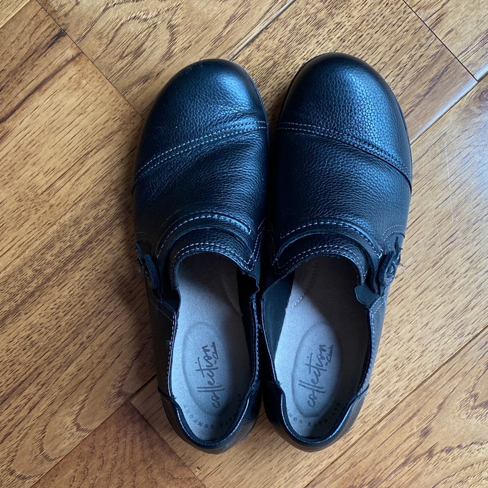 Clarks Black Leather Slip ons